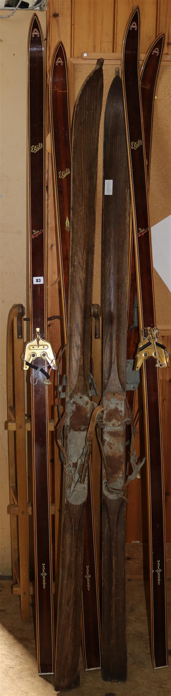3 pairs vintage skis and a sledge